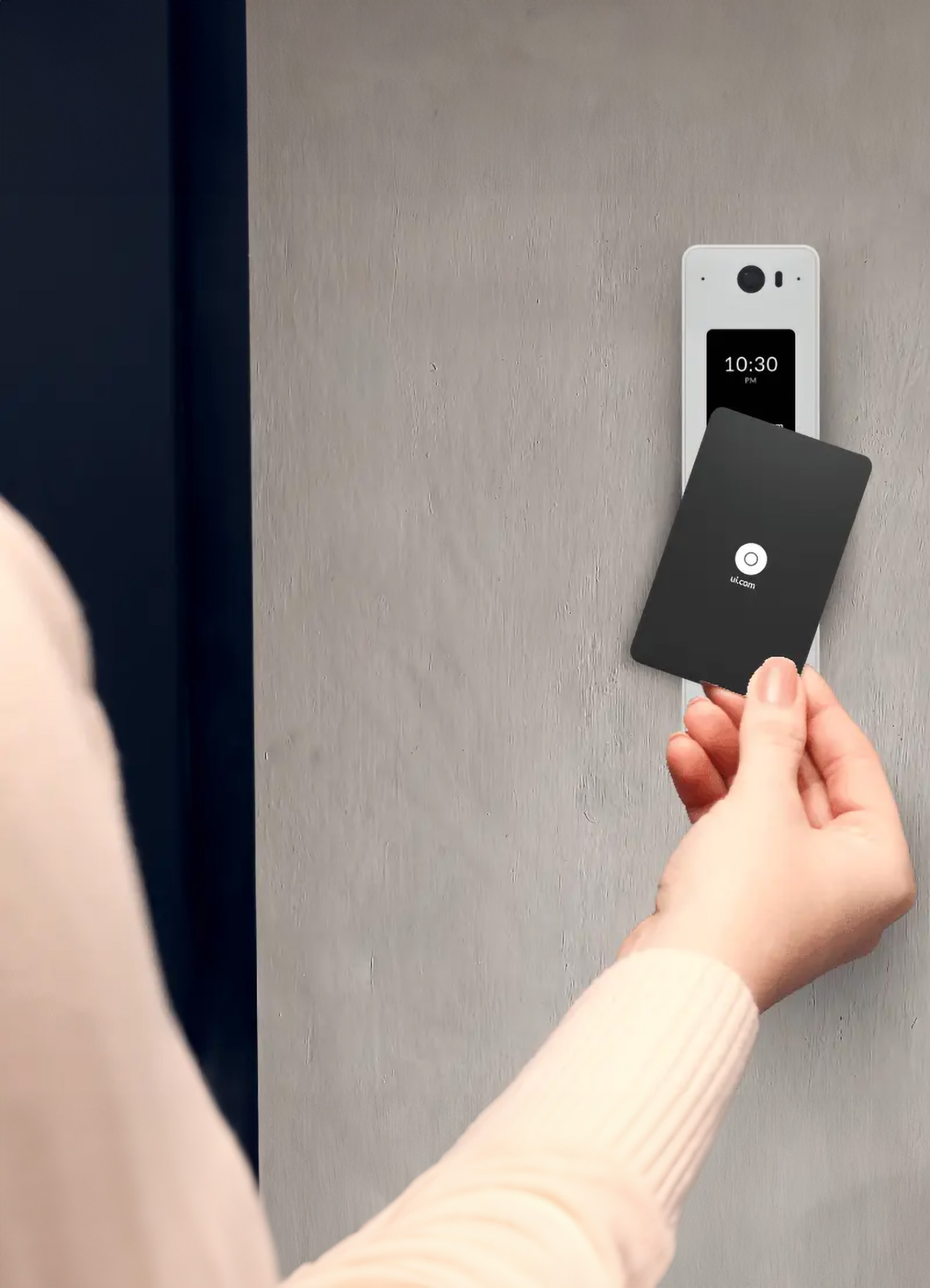 UniFi Door Access Control | SurfNet IT & Network Solutions Person using key card on Ubiquiti UniFi door access control system for secure business entry
