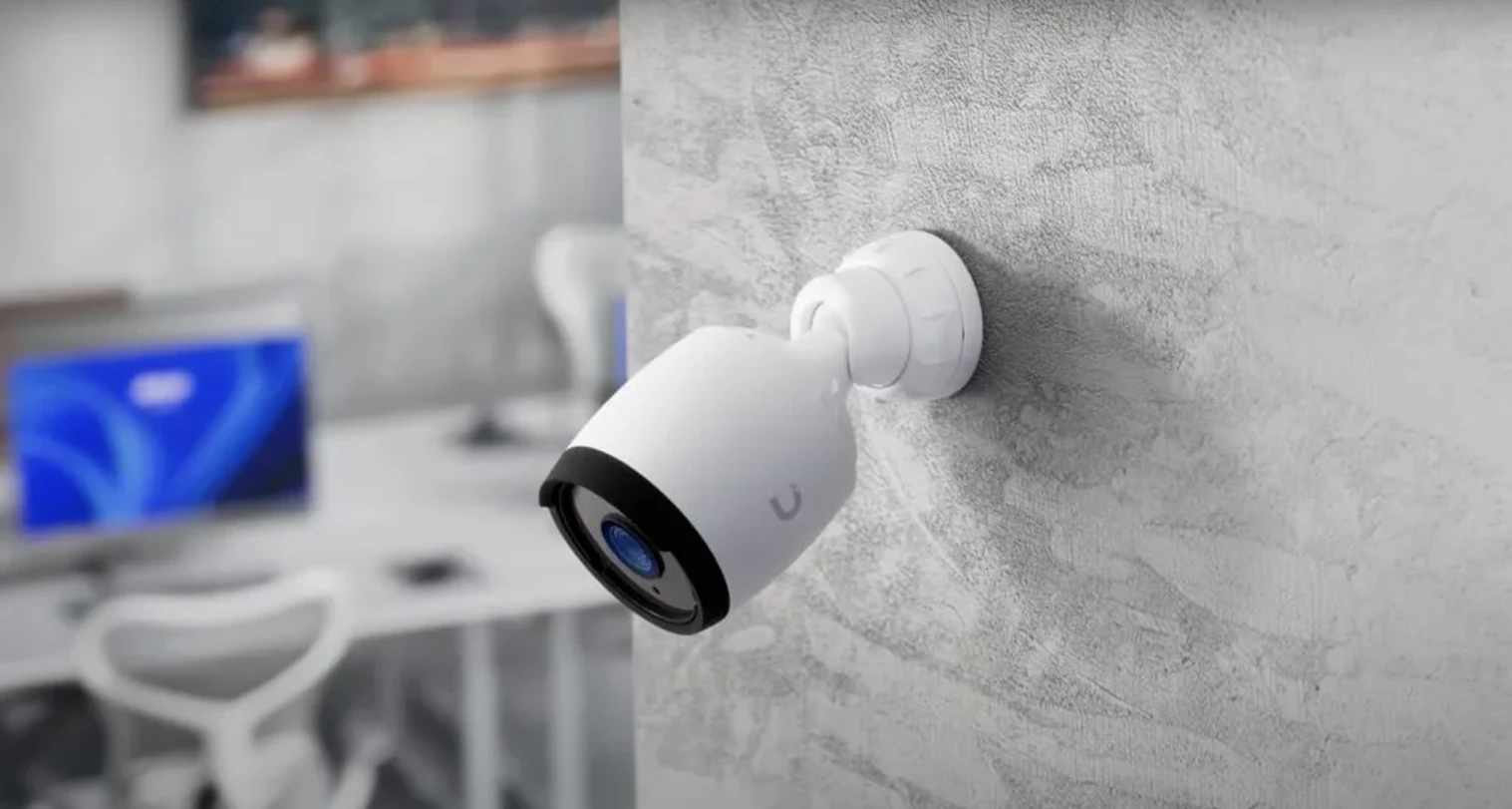 Smart home security camera installed on wall providing remote monitoring and alerts for homes in Jupiter Florida